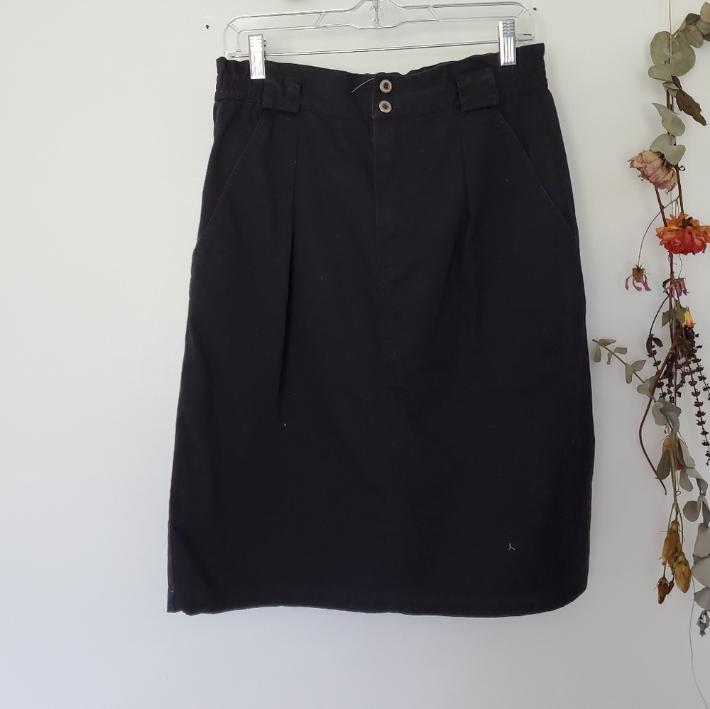Black denim skirt.